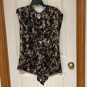 Almost new dressy blouse. Animal print. Looks nice with suit coat